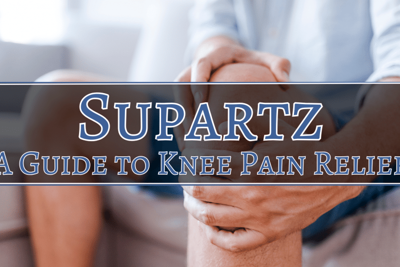 A person suffering from knee pain clutching their knee